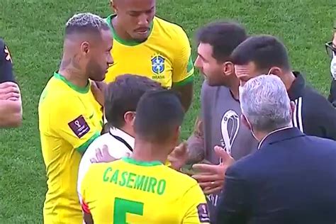 Lionel Messi appears in photographer's bib to talk to Neymar and officials during Brazil vs ...