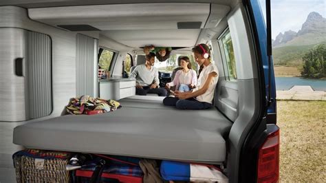 Family inside of the VW California | Vw california camper, Camper van conversion diy, Camper van