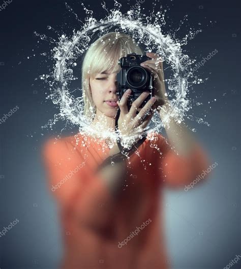 Girl photographing water splash — Stock Photo © papa42 #29741837