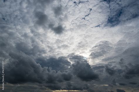 clouds with background,sunlight through very dark clouds background of ...