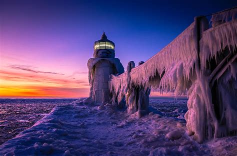 Frozen Lighthouse Sunset St. Joseph Michigan Photograph by Michelle Thompson - Fine Art America