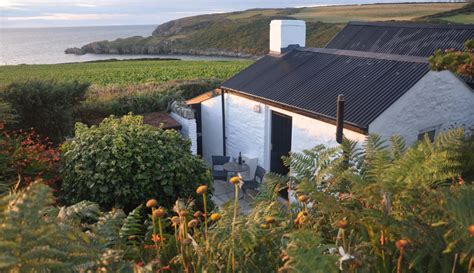 Pembrokeshire Luxury Coastal Cottage with Hot Tub, The Cable Hut | Unique Extras