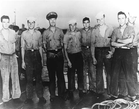 Crew members of destroyer escort USS Pillsbury who were the first party to board the German ...