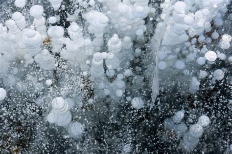 Beautiful Ice of Lake Baikal with Abstract Cracks and Frozen Air ...