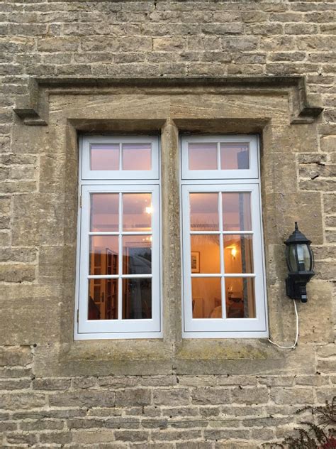 Flush casement windows fitted into stone mullion windows. | Windows, Window design, Timber windows