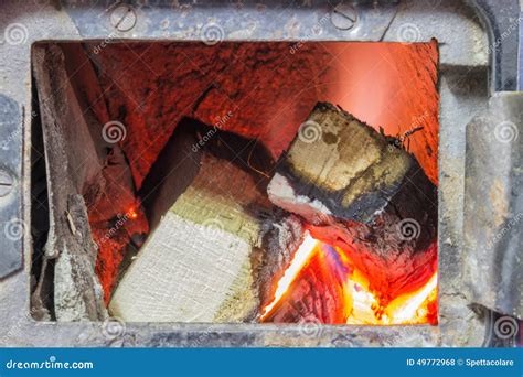 Wood Stove Firebox with Fire and Wood 3 Stock Photo - Image of comfortable, blurred: 49772968