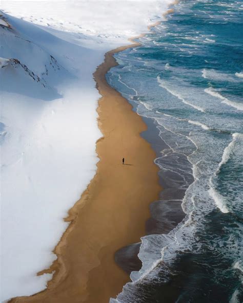 A beach in Japan where snow, sand and sea meet each other : r/BeAmazed