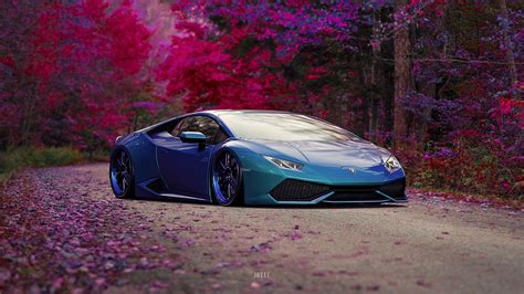 Обои на рабочий стол Голубой Lamborghini Huracan на дороге посреди осеннего леса, из игры Gran ...