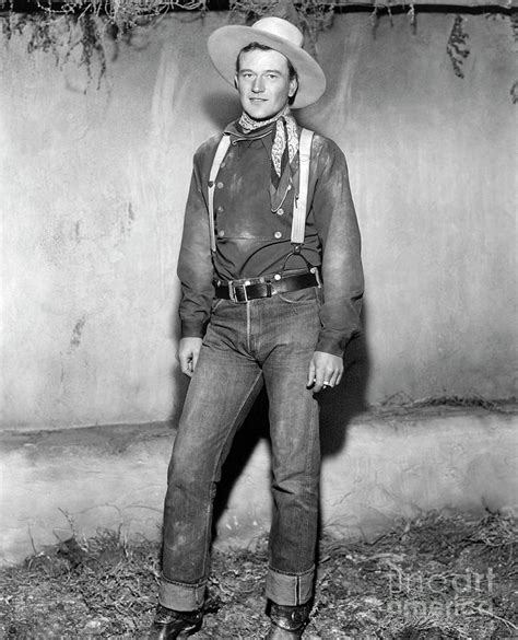 John Wayne In Costume For Stagecoach by Bettmann