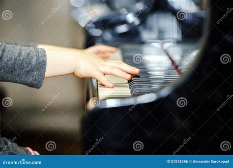 Cute Little Girl Playing Grand Piano Stock Photo - Image of cute ...