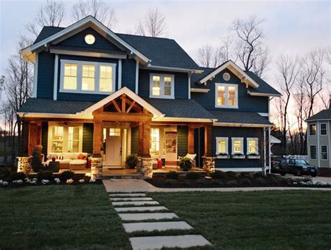 blue exterior home with wood porch - Google Search | House exterior ...