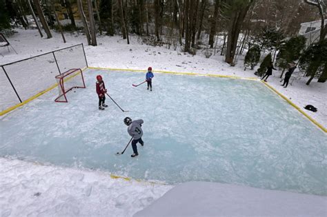 Backyard ice rinks find new popularity as families seek to beat the ...