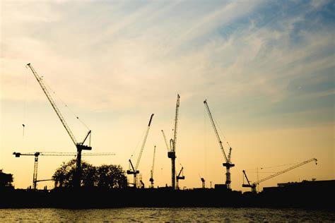 Construction cranes in Bangkok at sunset 1996154 Stock Photo at Vecteezy