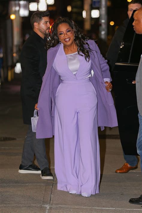 Oprah Winfrey in a Light Purple Outfit in New York 12/14/2023 • CelebMafia