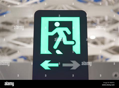 green exit sign Stock Photo - Alamy