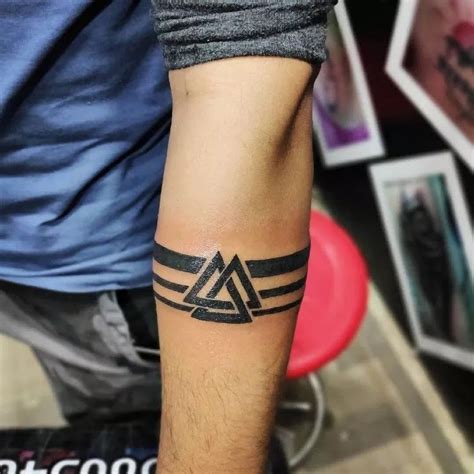 Armband tattoo men. | Band tattoo designs, Forearm band tattoos, Band ...