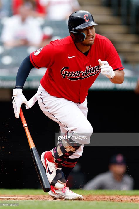 Josh Naylor of the Cleveland Guardians hits a one-run double off Jon ...