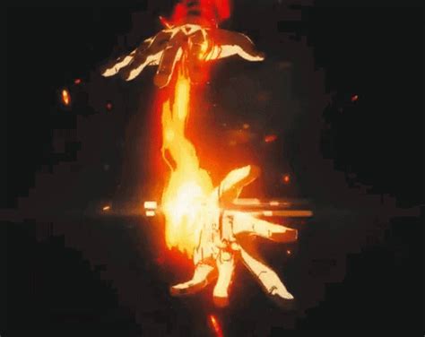 an artistic image of a person holding something in their hand with flames coming out of it