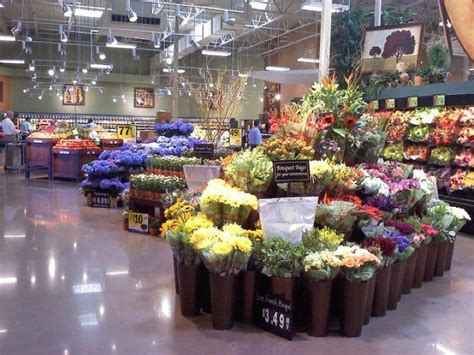 If you've got a Kroger Marketplace near your home, check it out for inexpensive wedding flowers ...