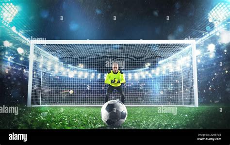 Soccer goalie ready to save a penalty kick at the stadium Stock Photo ...