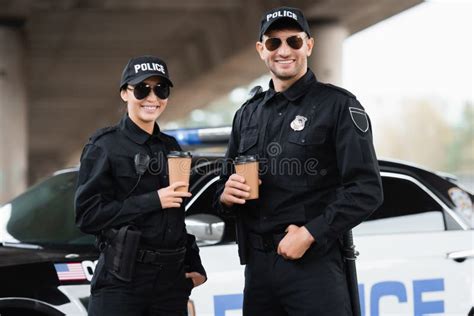 Smiling Police Officer Standing and Using Laptop Stock Image - Image of ...