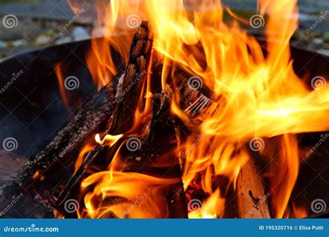 Wood burning in campfire stock photo. Image of campfire - 195320716