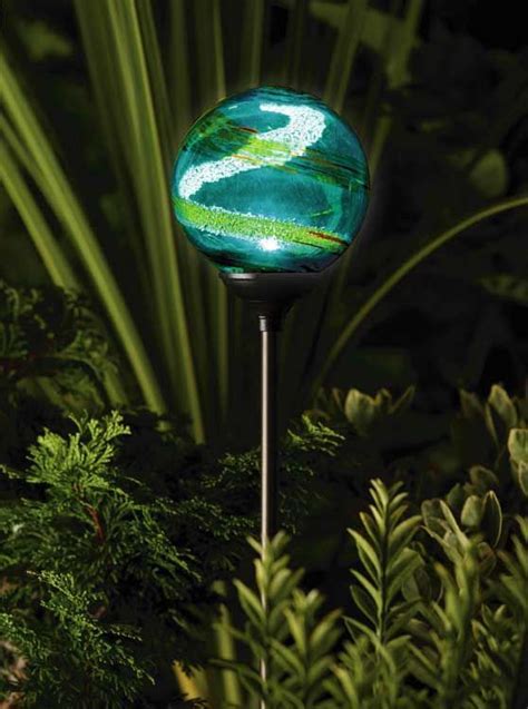 Outdoor Garden Lighting | solar powered garden globe by murano is an enchanting garden light ...