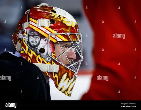 Calgary Flames goalie Dustin Wolf watches during NHL hockey training ...