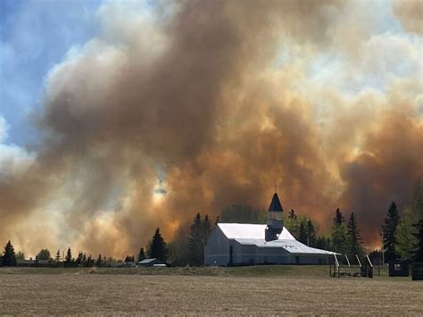 Provincial state of emergency declared in Alberta as wildfires spread and more residents flee ...