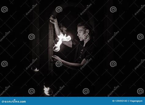 Fire show. Dance with Poi. stock image. Image of motion - 129493143