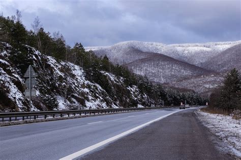 Road through Snowy Mountains · Free Stock Photo