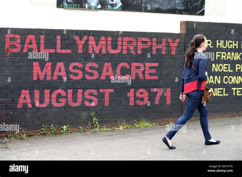 Murals dedicated to the 1971 Ballymurphy Massacre seen on a wall in ...