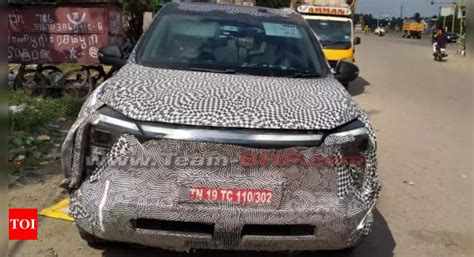 Mahindra XUV.E8: Mahindra XUV.e8 spied: New pics reveal interior details - Times of India