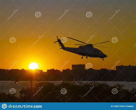 Helicopter Descending on the Sunset. Editorial Stock Photo - Image of ...