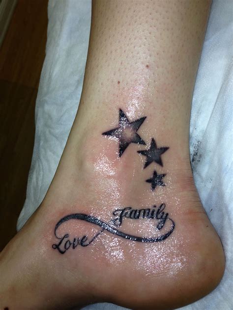 Family love infiniti symbol stars tattoo on side foot..... thinking of ...