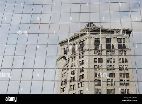 Reflected in the PNC Bank Building, the historic McKay Tower in ...