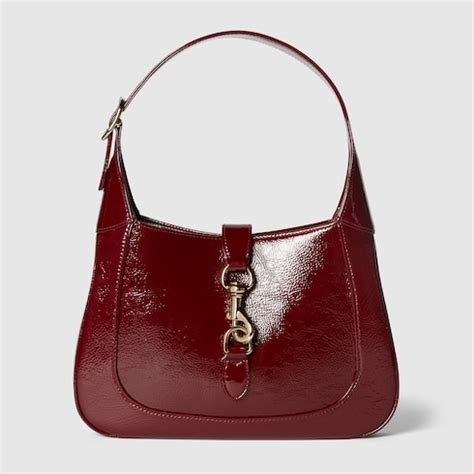 Gucci Jackie small shoulder bag in Rosso Ancora patent leather | GUCCI® US