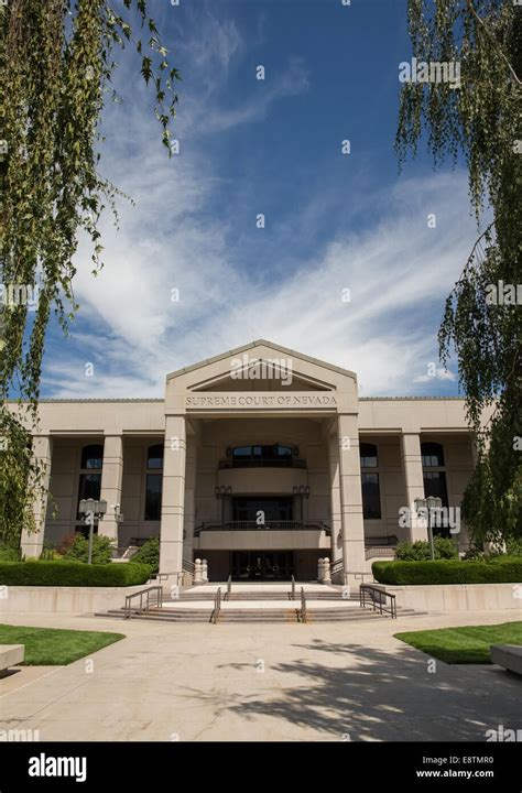 Nevada Supreme Court building in Carson City, the Nevada state capital. Set against a blue sky ...