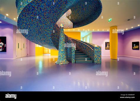 Central hall with spiral stairs of the Groninger Museum of modern art Stock Photo, Royalty Free ...