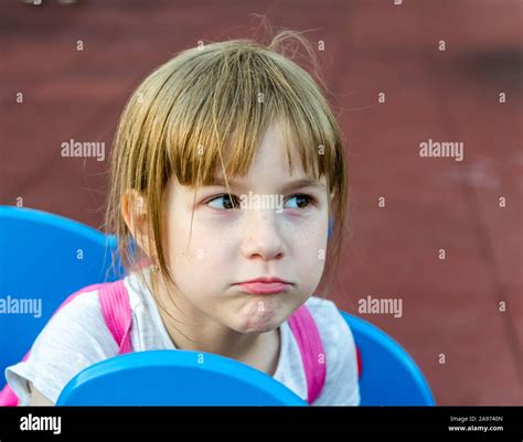 Little girl made a funny face Stock Photo - Alamy