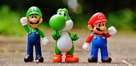Focus Photo of Super Mario, Luigi, and Yoshi Figurines · Free Stock Photo