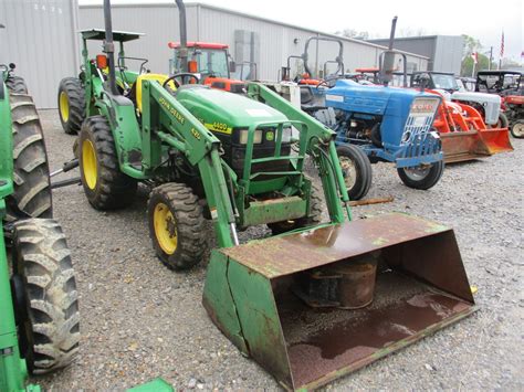 2000 JOHN DEERE 4400 FARM TRACTOR, VIN/SN:340460 - MFWD, FRONT LOADER BUCKET ATTACHMENT, REAR JOHN D