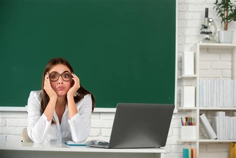 Premium Photo | Portrait of a young sad serious and concerned female student studying in school ...