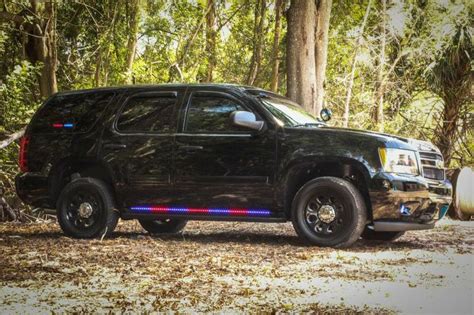 2013 Chevy Tahoe Outfitted with Blue/Red HG2 Side Runners - Fort Myers ...