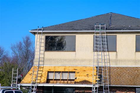 Damaged Roof Shingles Repair Stock Image - Image of outdoors, roof: 242314449