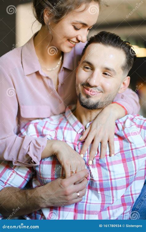 Young Charming Wife Hugging Husband at Home. Stock Photo - Image of ...