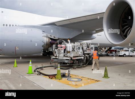 A Lufthansa Boeing 747-8 being fueled Stock Photo - Alamy