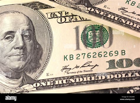 Dollars closeup. Benjamin Franklin portrait on one hundred dollar bill Stock Photo - Alamy