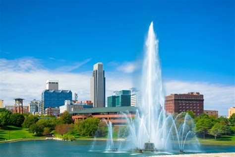 Omaha skyline with fountain and lake | Considering Adoption