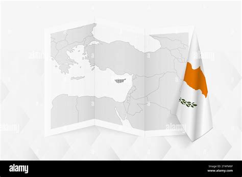 A grayscale map of Cyprus with a hanging Cypriot flag on one side ...